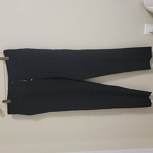 Authentic Dolce Gabbana womens black pants in  good condition size 28